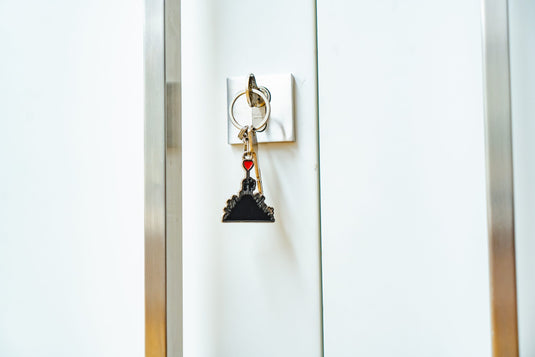 Metall Schlüsselanhänger - Kids On Guns